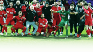 Anstey Nomads’ players celebrate their victory over Hartlepool United
