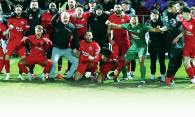 Anstey Nomads’ players celebrate their victory over Hartlepool United