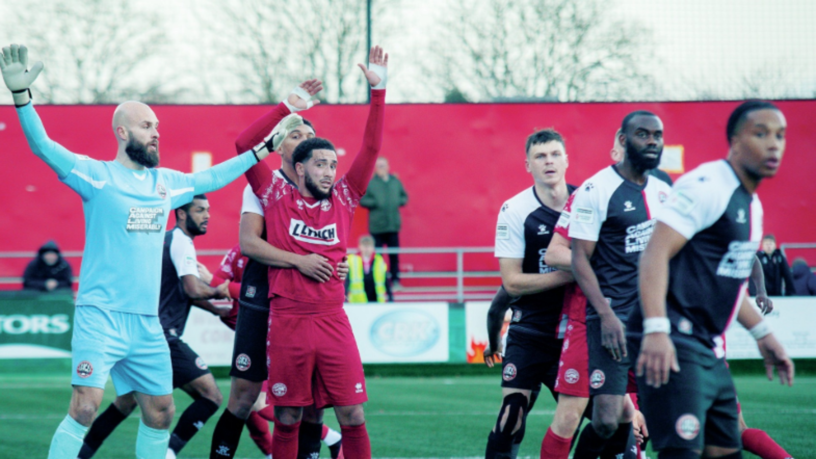 Players jostle in battle from a set-piece as gruelling clash ends goalless