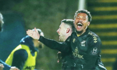Cal Roberts is congratulated by Scunthorpe teammate Tyler Denton after scoring his and his side’s second goal