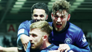 Harvey Gilmour celebrates the winner for Rochdale