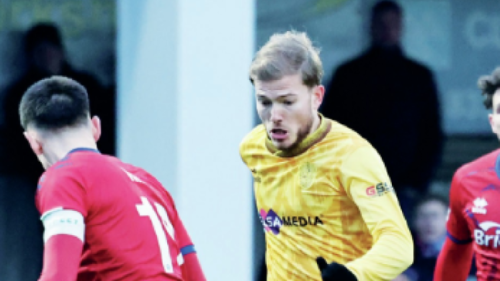 Lewis Simper runs at the Aldershot defence