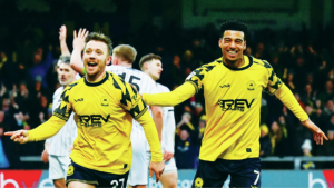 Goal celebrations for Matt Jay and Louis Dennis of Torquay United, making it 2-0