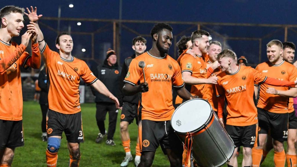 Bilston Town players celebrate after reaching the fifth round of the Isuzu FA Vase