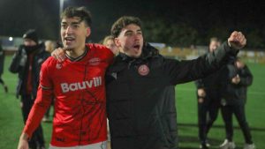 Chatham Town players celebrate their Isuzu FA Trophy fourth round victory over Carlisle United