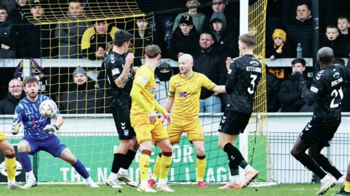 Hiram Boateng’s shot through a crowd levels for York City against Sutton United