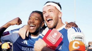 Paul Dawson, right, celebrates with Isaac Buckley-Ricketts