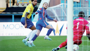 Luke Armstrong fires in to put Carlisle 1-0 ahead