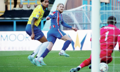 Luke Armstrong fires in to put Carlisle 1-0 ahead