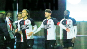Maidenhead players celebrate with the bench following Matt Robinson’s last-minute winner