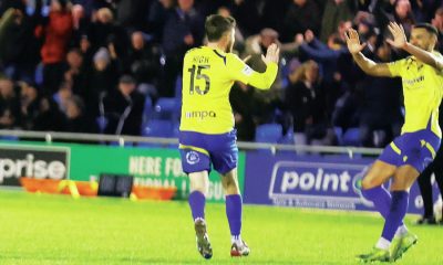 Scott High, left, takes the plaudits after scoring Solihull’s last-gasp equaliser
