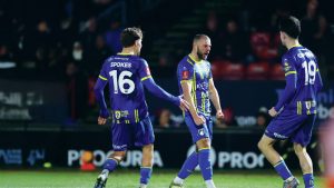 Coulson (centre) celebrates making it 1-1 for Weston and (inset) players applaud supporters after the final whistle