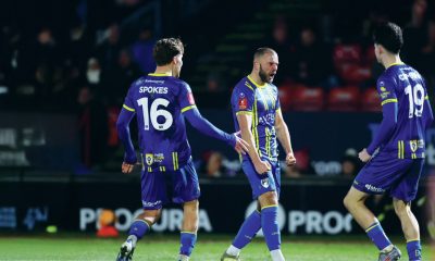 Coulson (centre) celebrates making it 1-1 for Weston and (inset) players applaud supporters after the final whistle