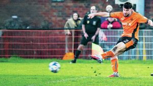 Bilston Town’s Jordan Crump fires home the winning goal