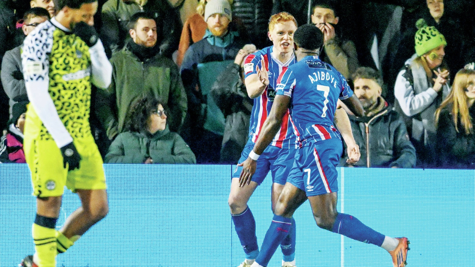 David Ajiboye celebrates with goalscorer Aaron Hayden after he makes it 2-0