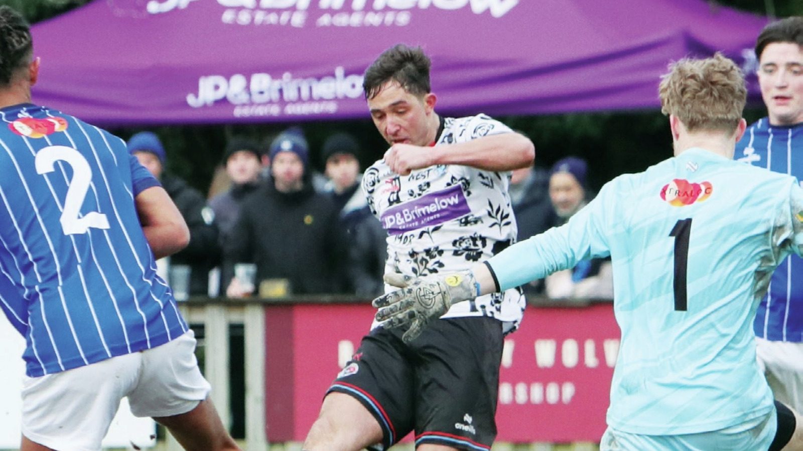 Brandon Dawson slots home West Didsbury & Chorlton’s second goal