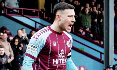 Callum Roberts celebrates the opener on his 100th appearance for Scunthorpe United