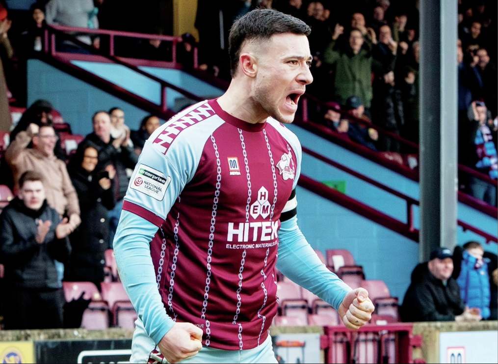 Callum Roberts celebrates the opener on his 100th appearance for Scunthorpe United