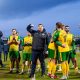 Horsham players and staff celebrate their victory over Scunthorpe United in the Isuzu FA Trophy