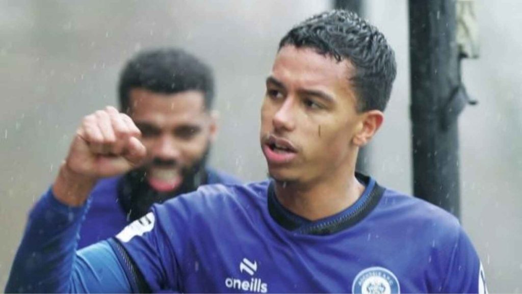 Kyron Gordon celebrates the opening goal for Rochdale against Woking