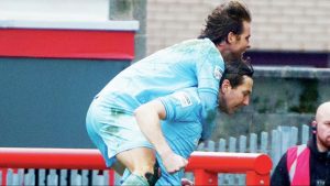 Truro City’s Tyler Harvey and Shaun Donnellan celebrate