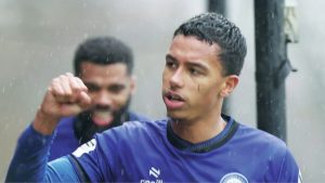 Kyron Gordon celebrates the opening goal for Rochdale