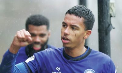 Kyron Gordon celebrates the opening goal for Rochdale
