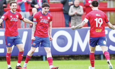 Aldershot scorer Sean Patton, centre, celebrates with Hady Ghandour, left, and Ryan Hill