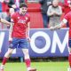 Aldershot scorer Sean Patton, centre, celebrates with Hady Ghandour, left, and Ryan Hill
