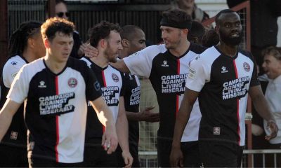 Liam Dulson is mobbed by team-mates after doubling Maidenhead United’s lead
