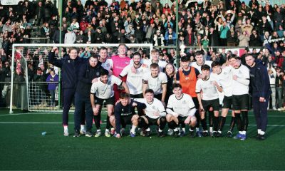 Marine players and supporters celebrate their giant-killing