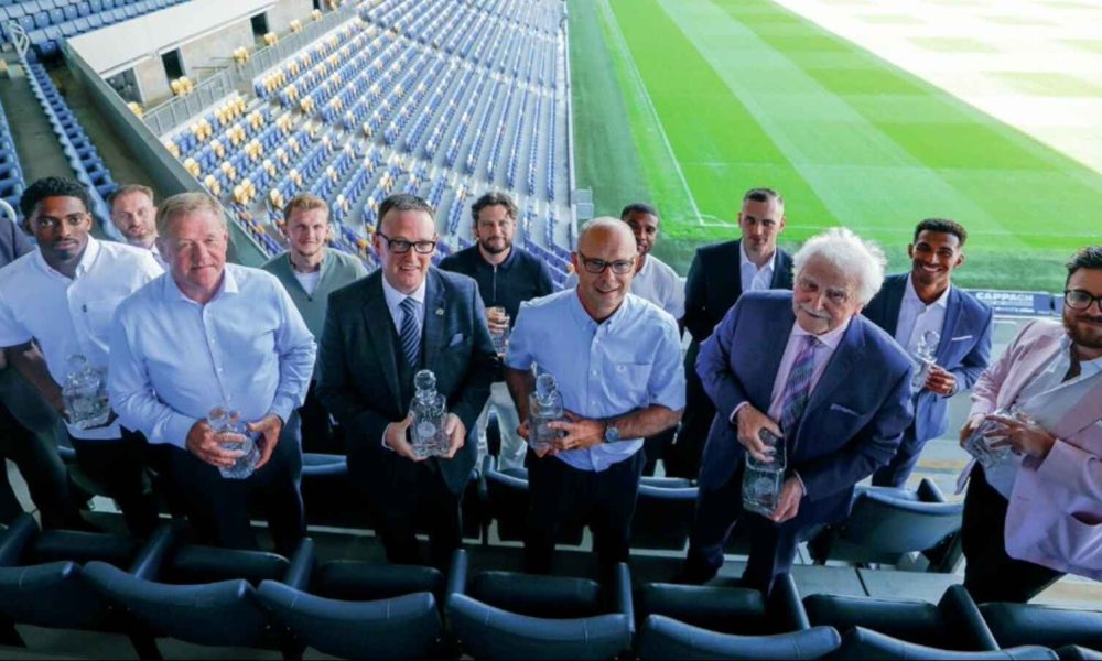 Last year’s NGA winners parade their trophies at AFC Wimbledon