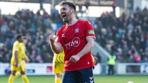 Ollie Pearce celebrates scoring for York City against Brackley Town