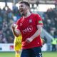 Ollie Pearce celebrates scoring for York City against Brackley Town