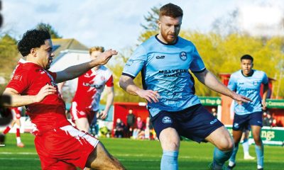 Poole’s Selim Saied, left, and Gloucester’s Morgan Lewis battle for the ball
