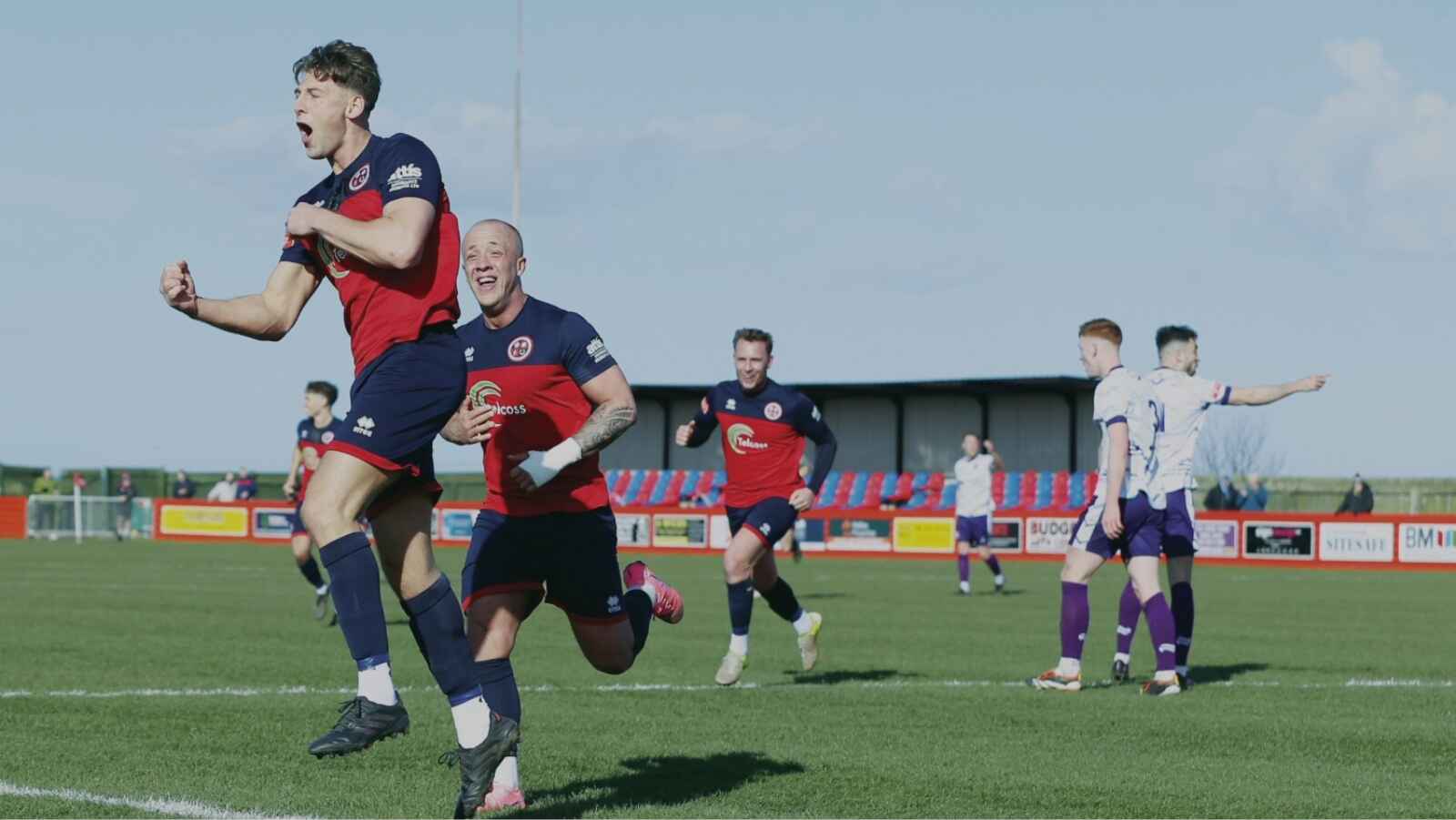 Redcar Athletic players celebrate as the Steelmen keep firing after sealing the title.
