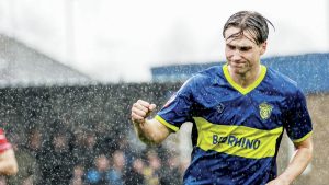 Spalding United’s Jack Roberts wheels away after scoring from the penalty spot