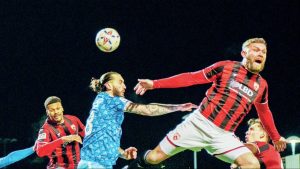 York’s Ollie Banks defend a Morecambe corner