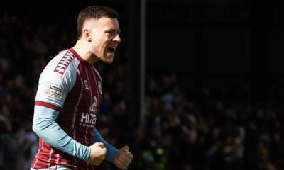 Callum Roberts celebrates scoring his free-kick for Scunthorpe United