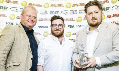 Farnham Town’s Harry Hugo, centre, and Frankie Hobbs, right, receive their award from the Non-League Show’s Tim Fuell