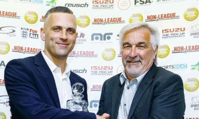 Joe Taylor, left, picks up his award from SK Kits’ Ian Senior