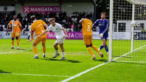 Boreham Wood ace Matt Rush heads in his second goal
