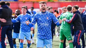 York City goalscorer Pearce celebrates at the final whistle after a hard-fought win