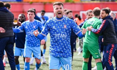 York City goalscorer Pearce celebrates at the final whistle after a hard-fought win