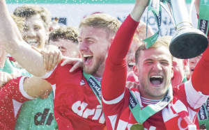 Worthing players and fans celebrate promotion