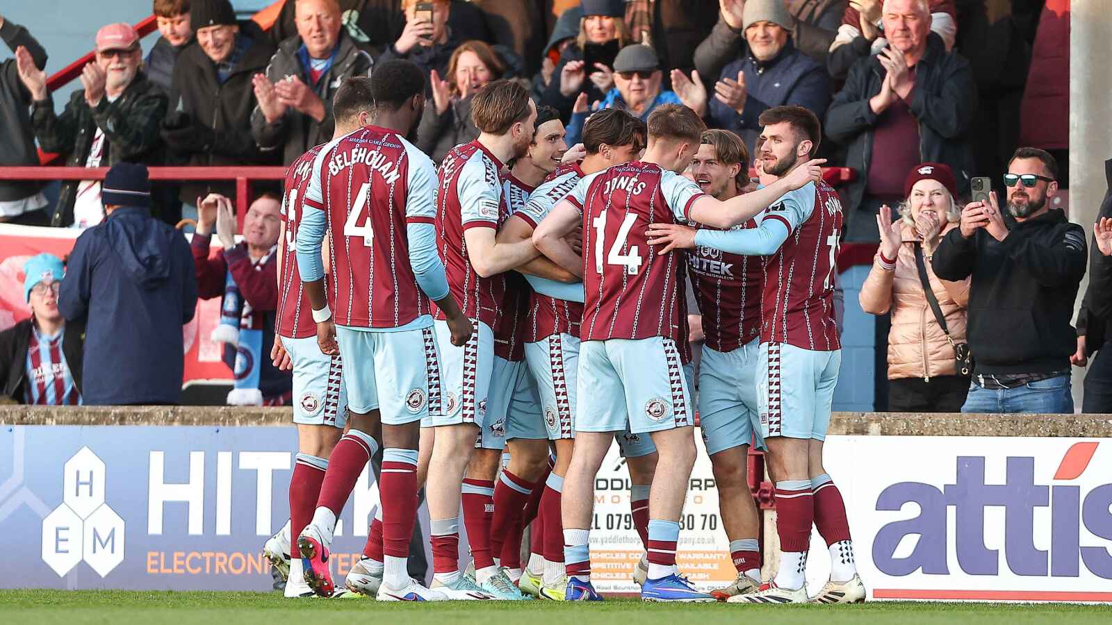 Scunthorpe United celebrate Callum Roberts’ early opener that booked their place in the semi-finals