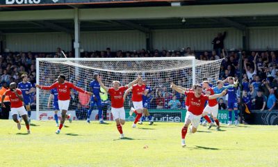 York City players wheel away in jubilation after Josh Stones squeezes in their winner