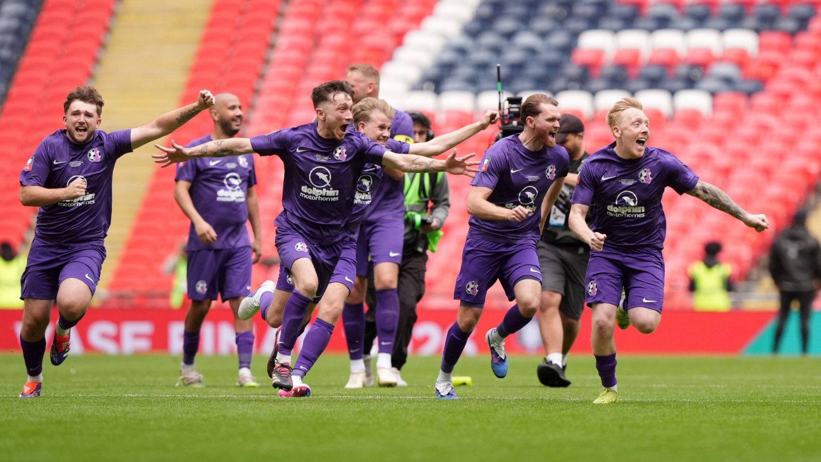 AFC Stoneham players celebrate after winning the Isuzu FA Vase at Wembley