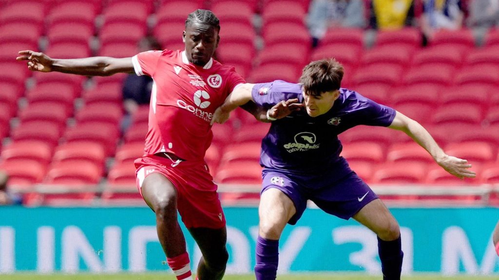 AFC Stoneham&rsquo;s Ollie Jenkins and Cockfosters&rsquo; Junior Mubiayi compete for possession