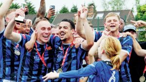 Grant Shenton’s Avro celebrate winning promotion to Step 3 for the first time last month